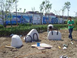 hj1736 石雕—箱包_青島國際服裝城不銹鋼雕塑、石雕、玻璃鋼雕塑_濱州宏景雕塑有限公司